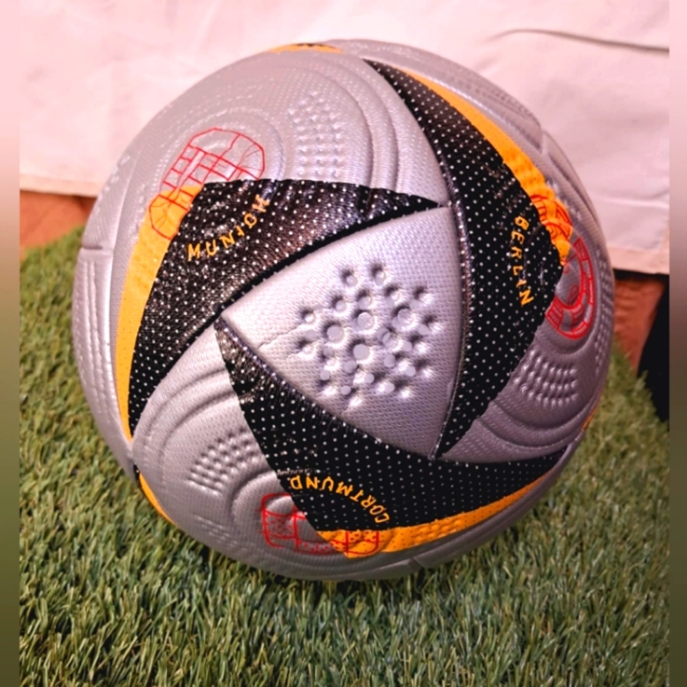 Soccer ball #5 gray, black and yellow color.